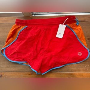 Tory Sport by Tory Burch NWT Color block nylon short in red/Tory orange Size M